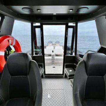 a boat sitting on top of a chair